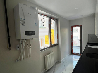 Güngören Güven Mah 1,Kat Asansörlü 85 m2 Sıfır Ön Cephe 2+1 Balkonlu 