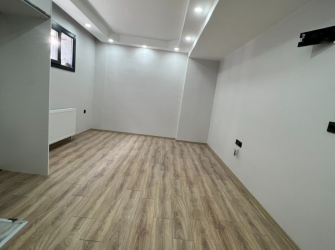 Güngören Haznedar'da 1+1 Açık Mutfaklı 50 m2 Bahçe Katı 