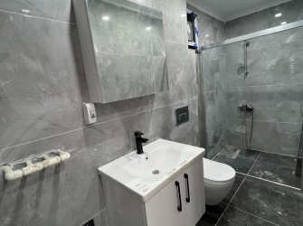 Güngören Haznedar'da 1+1 Açık Mutfaklı 50 m2 Bahçe Katı 